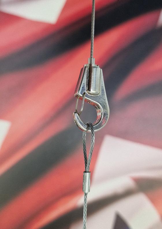 MetallicG Gripper system against a colorful abstract background