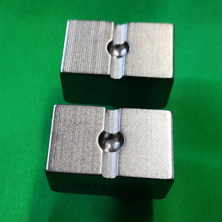 Photo of the top of a ball die set used with a YCP on green background
