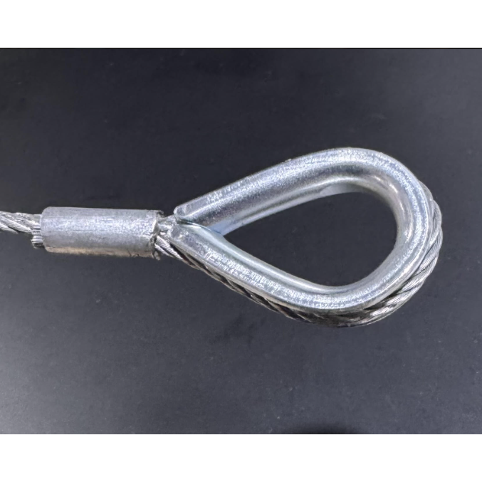 Wire rope assembly with thimble eye, hard eye on a black background