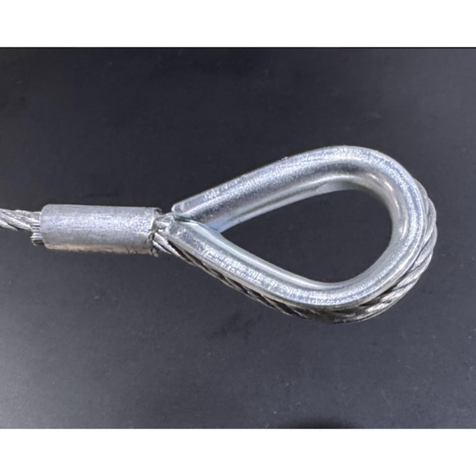 Wire rope assembly with thimble eye, hard eye on a black background