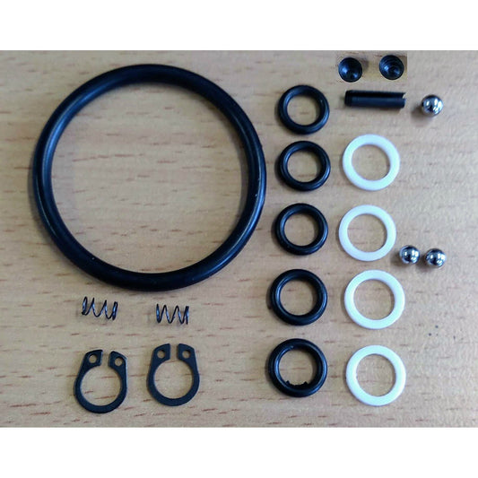 Photo of the contents of YCP 240C service kits laid out on table. 